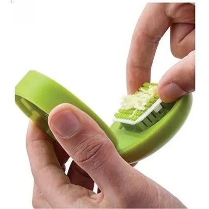 Effortless Mini Garlic Chopper & Press - Manual Mincer with Storage Container, Stainless Steel Blades, Ergonomic Grip, Vibrant Green Design